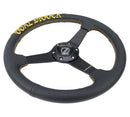 NRG 350mm sport steering wheel (1.5' deep) black perforated Leather with Gold stitching - Matte Black Solid Spokes, Goal Digger Gold stitching in front - RST-037MB-PR-GD